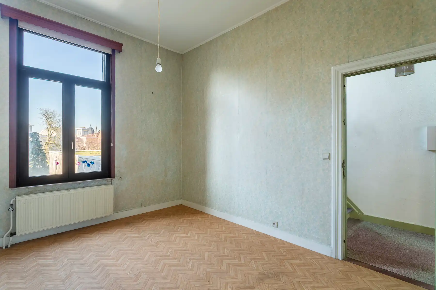 Te renoveren herenwoning met ruime tuin in Zurenborg foto 16