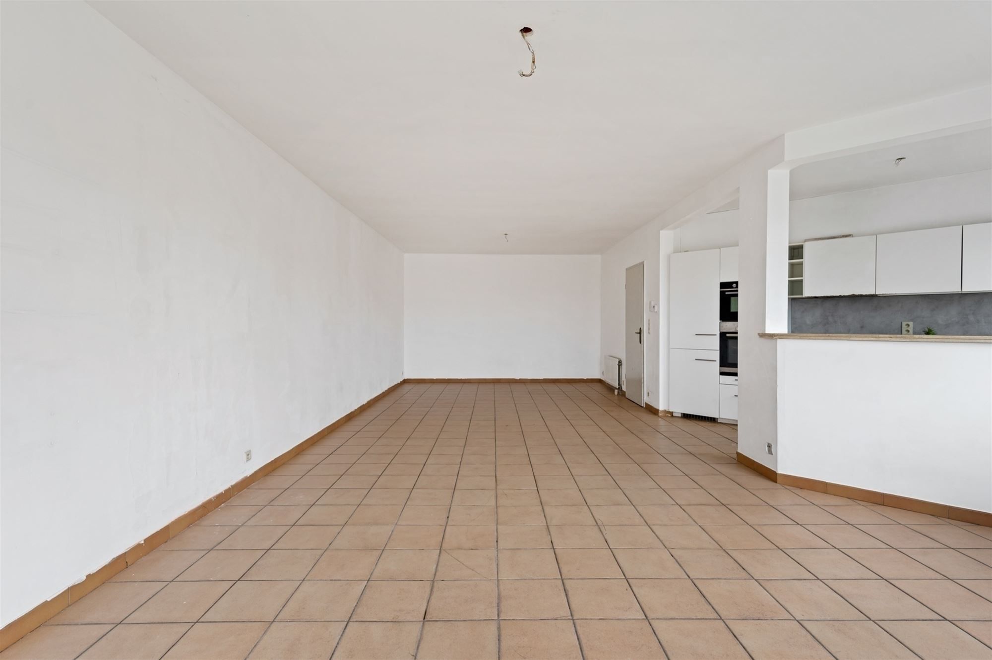 Opbrengsteigendom - 2 appartementen + handelspand te Lier foto 5
