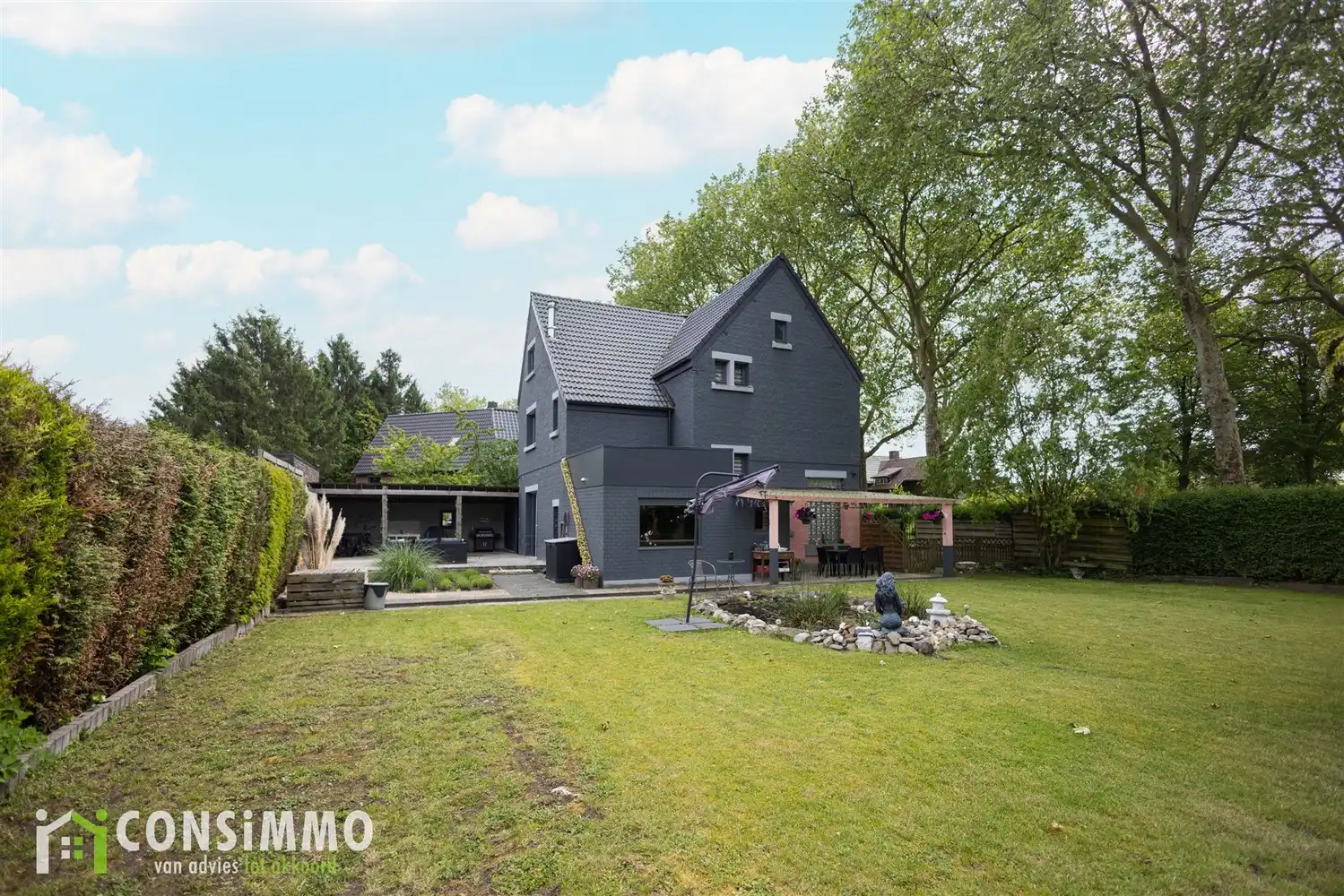 Vrijstaande karaktervolle mijnwoning in de tuinwijk van Waterschei foto 2