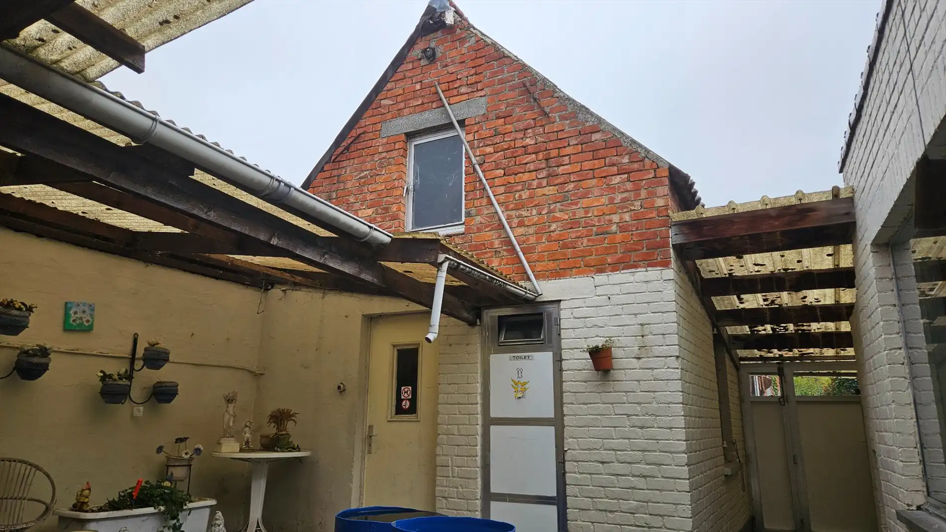 Ruime en stevige op te frissen woning met 4 slk, garage en tuin (met bijgebouw)  foto 19