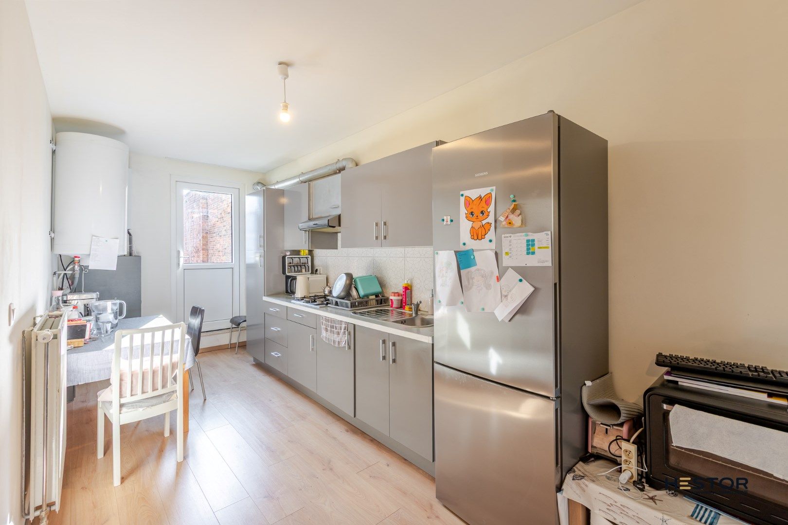 Centraal gelegen handelsruimte met duplex appartement in Sint-Niklaas foto 8