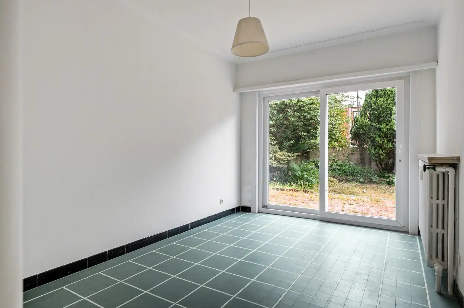 Ruim gelijkvloers appartement met 3 slaapkamers, tuin en garage! foto 8