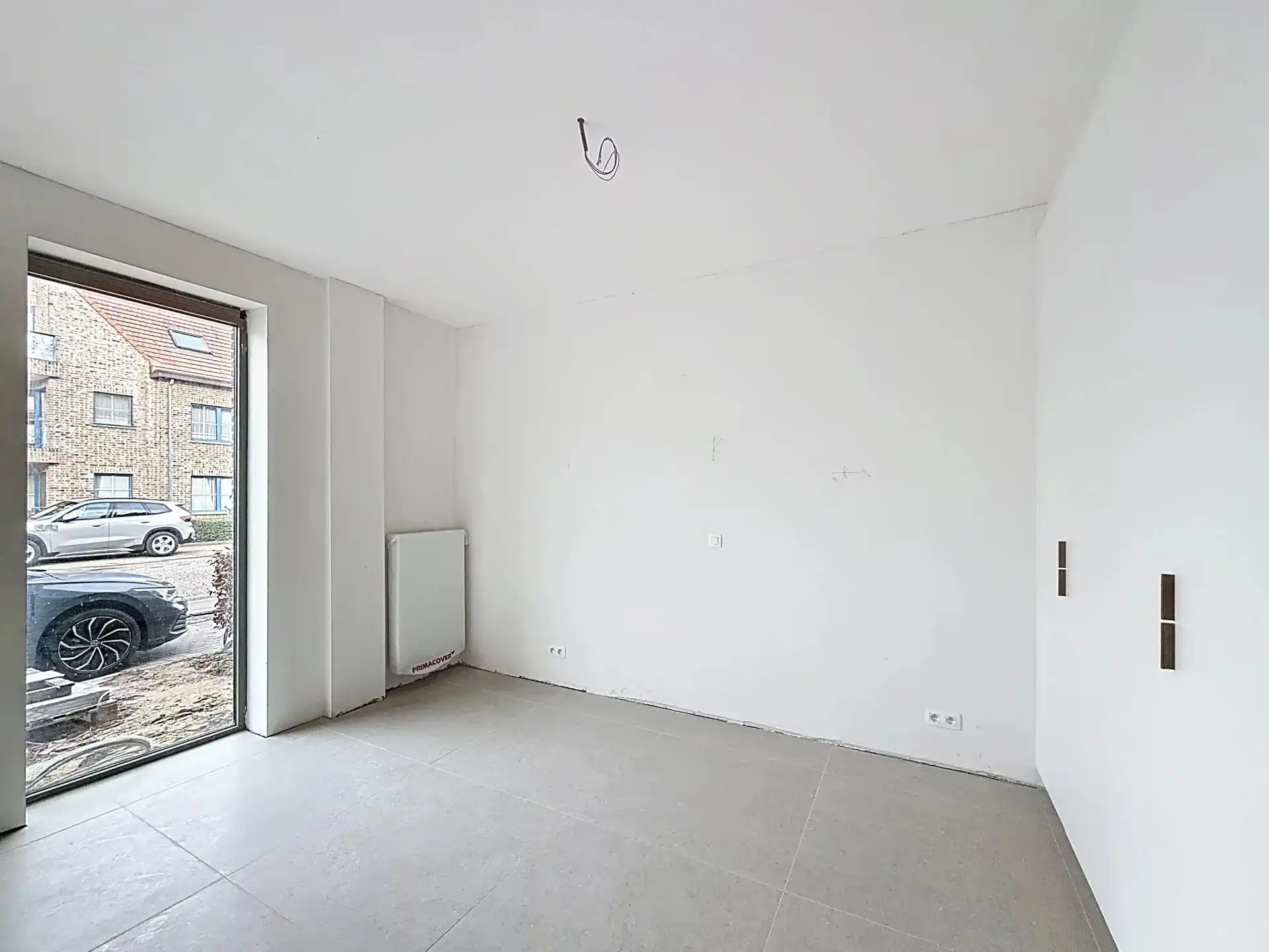 Luxueus en modern afgewerkt gelijkvloers appartement met tuin, 1 slaapkamer en 2 staanplaatsen. foto 13