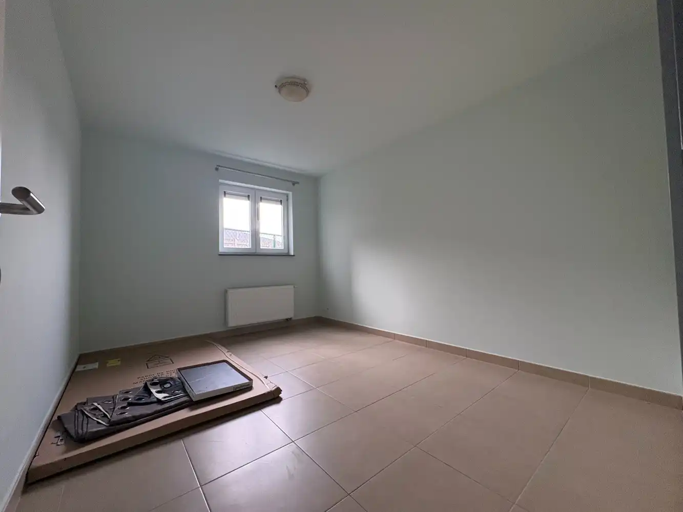 Gelijkvloers appartement met twee slaapkamers + autostaanplaats foto 7