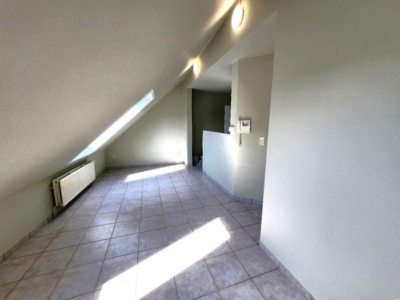 Tweeslaapkamer appartement mét garage in het centrum van Sint-Baafs-Vijve ZONDER SYNDICKOSTEN! foto 3
