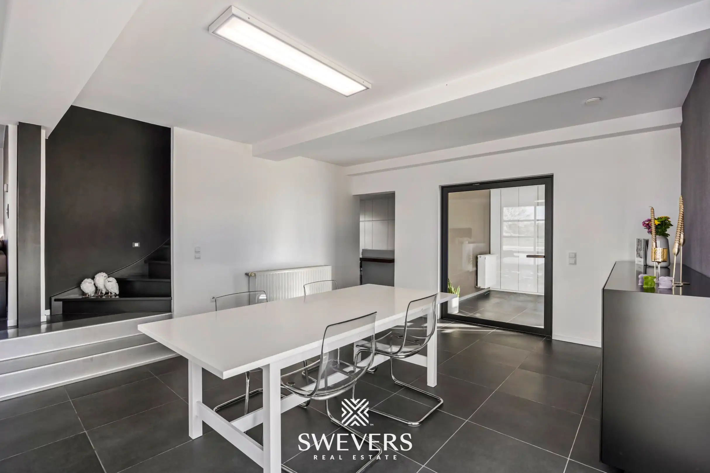 Instapklare open bebouwing met ruime tuin en prachtig uitzicht tussen de boomgaarden in Gingelom foto 8