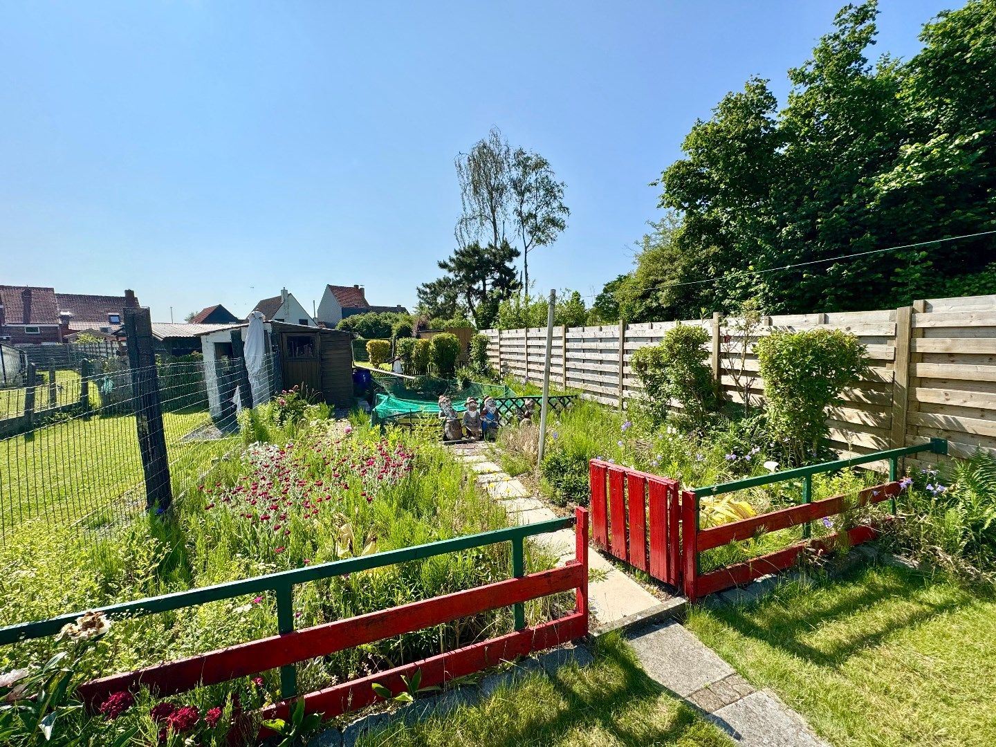 RIJWONING MET  3 SLPKS, GARAGE EN TUIN foto 4