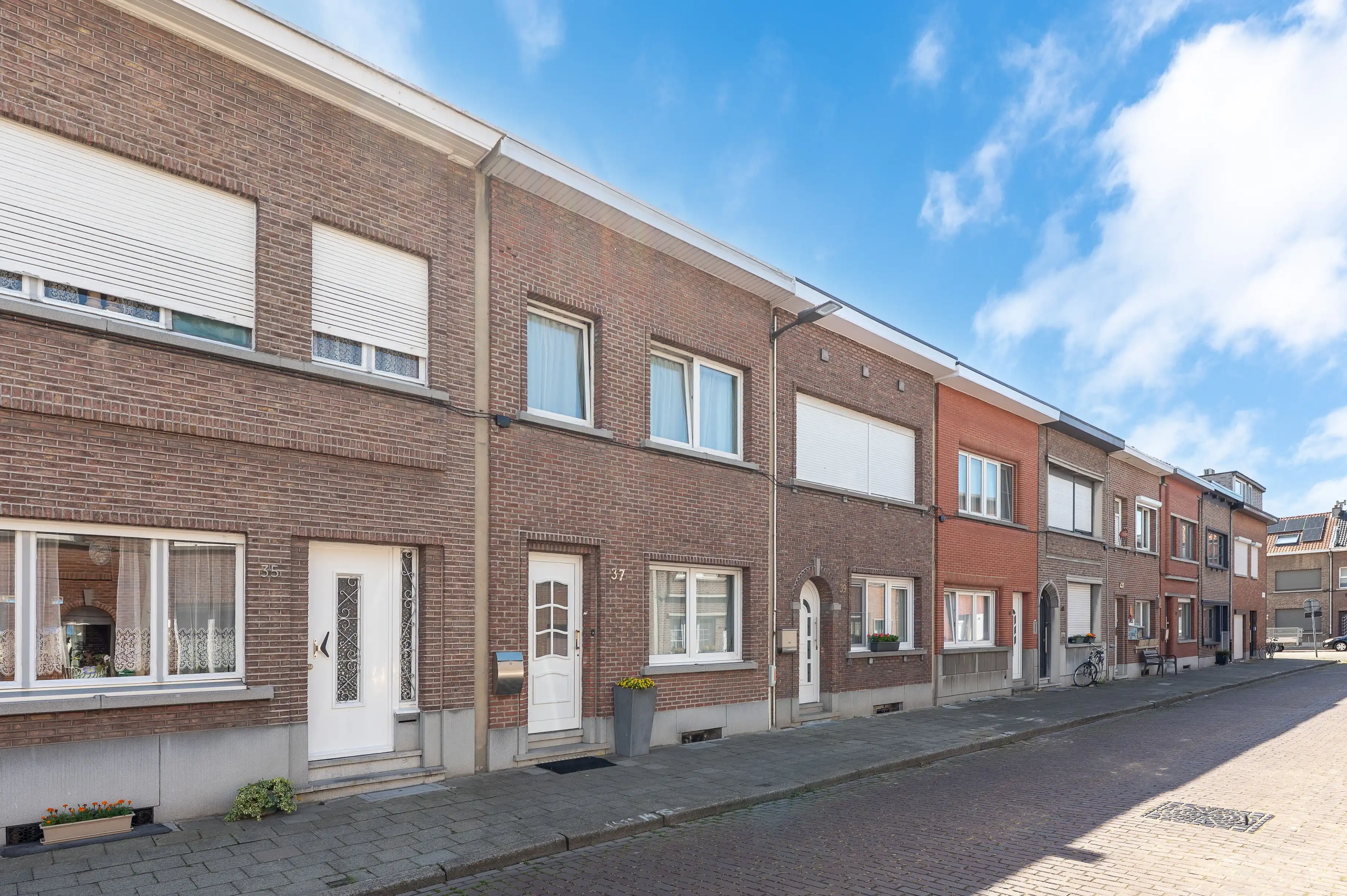 Instapklare gezinswoning met een gezellige tuin, vlak bij het centrum van Merksem! foto 30