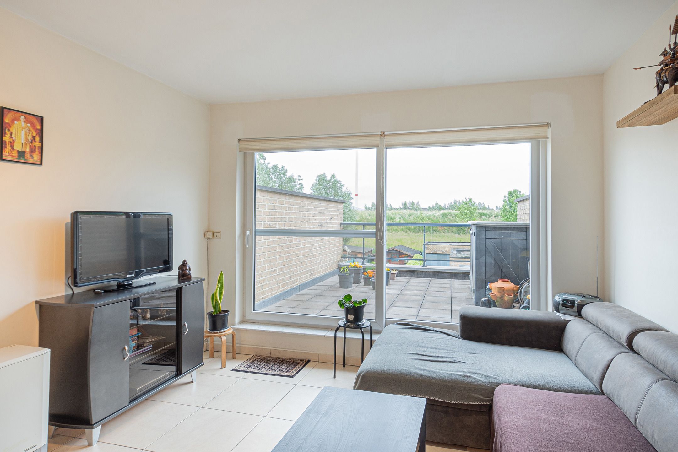 Instapklaar 1-slaapkamerappartement met garage foto 3