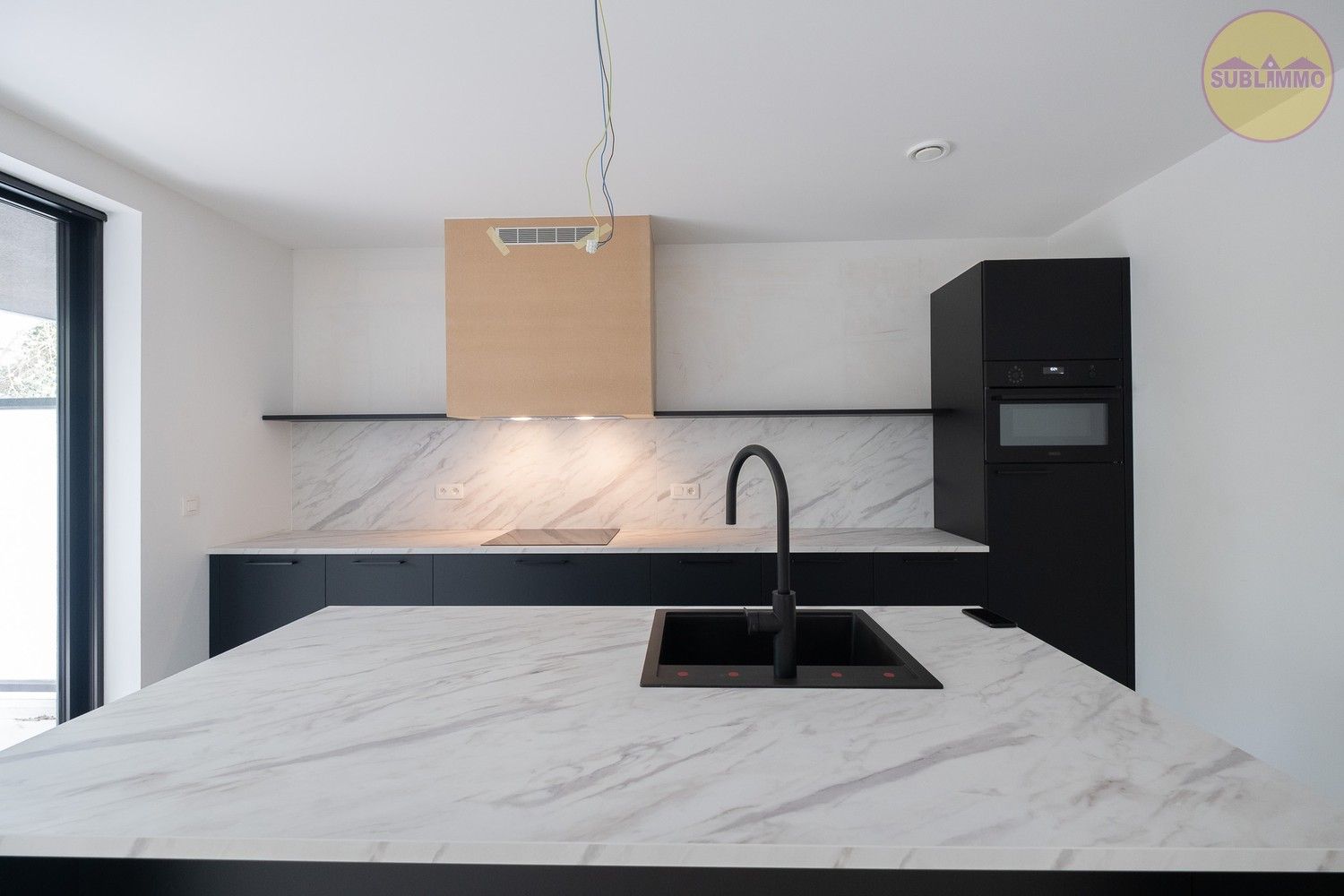 Nieuwbouwappartement op de eerste verdieping (118,50 m²) met 3 slaapkamers en terras. foto 6