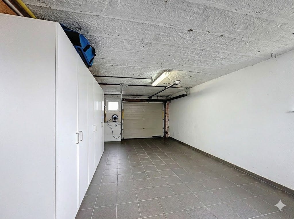 Lichtrijk en instapklaar huis met tuin te koop in Heist foto 16