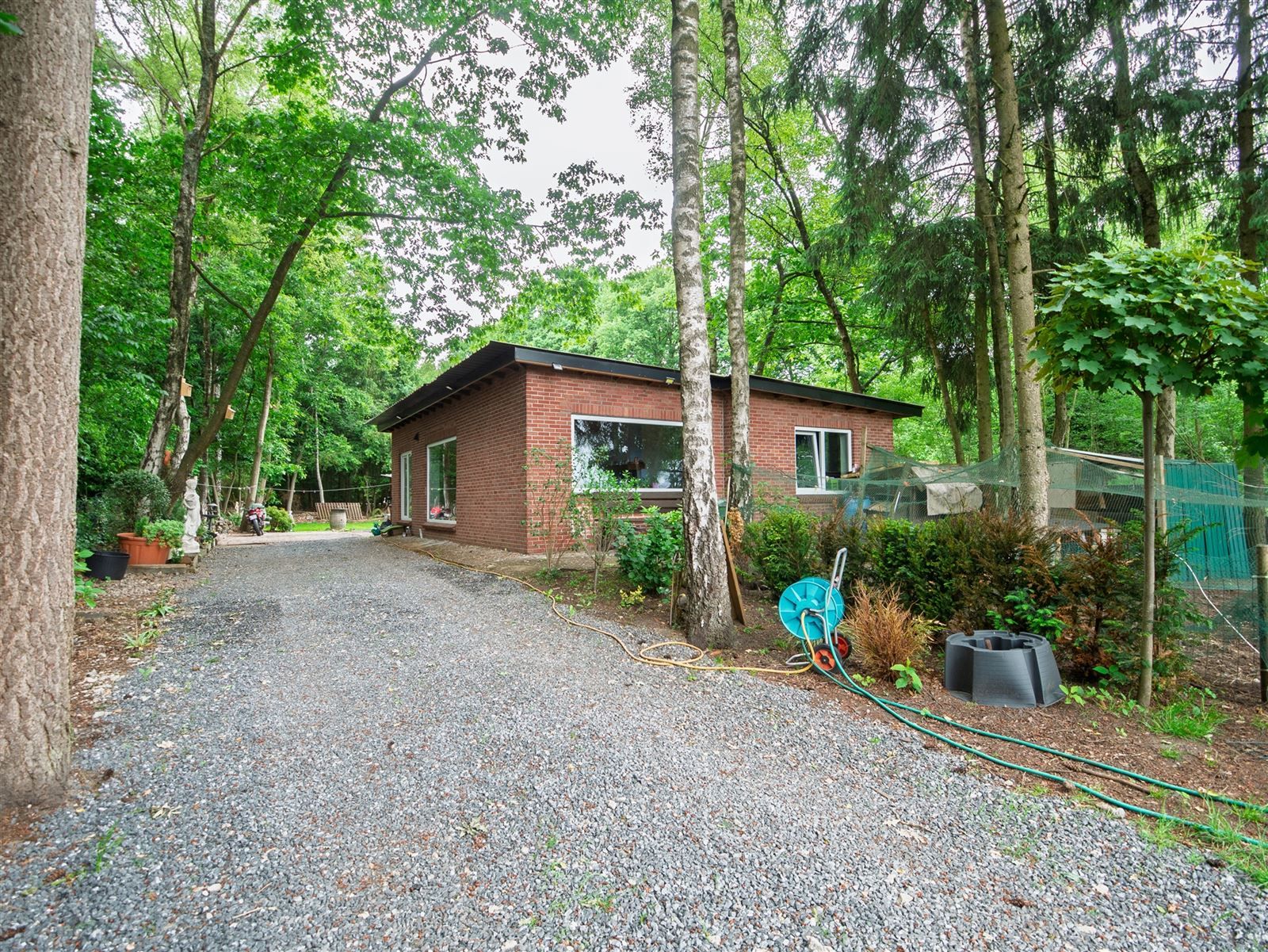 Huis foto {{pictureIndex}}