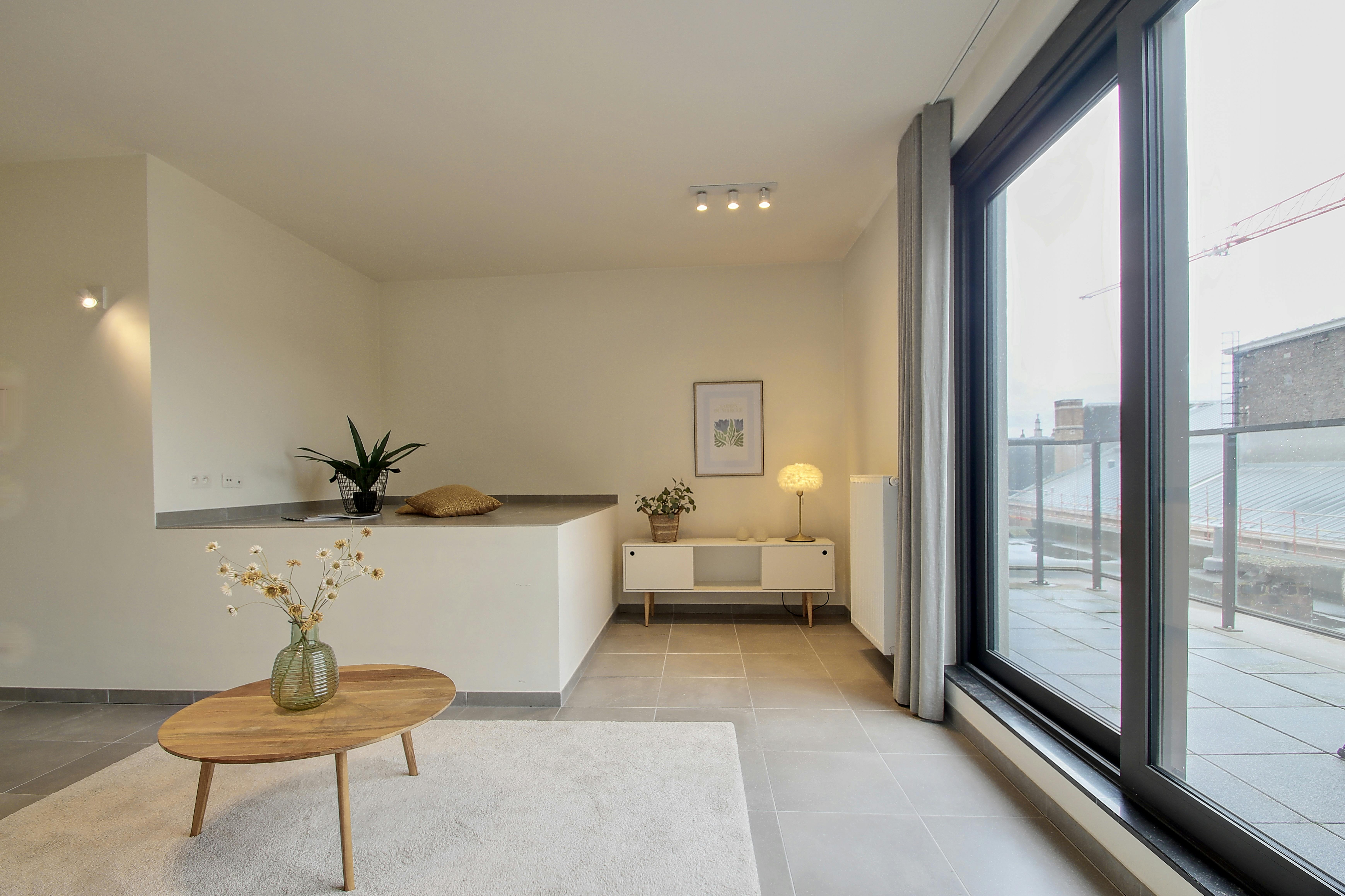 Ruim nieuwbouwappartement te koop in het centrum. foto 25