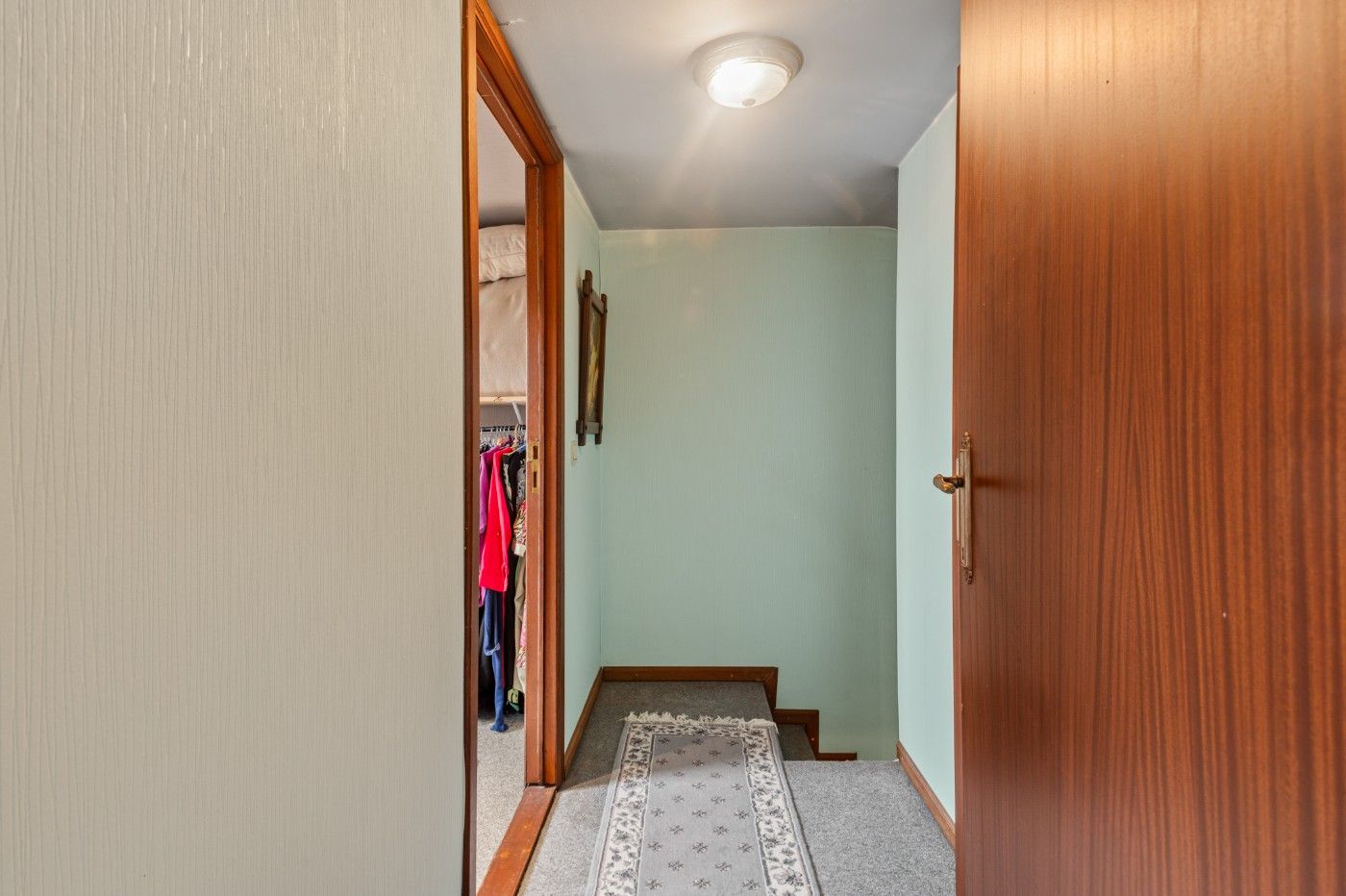 Te renoveren bel-etagewoning met 3 slpk., inpandige garage en tuin foto 14