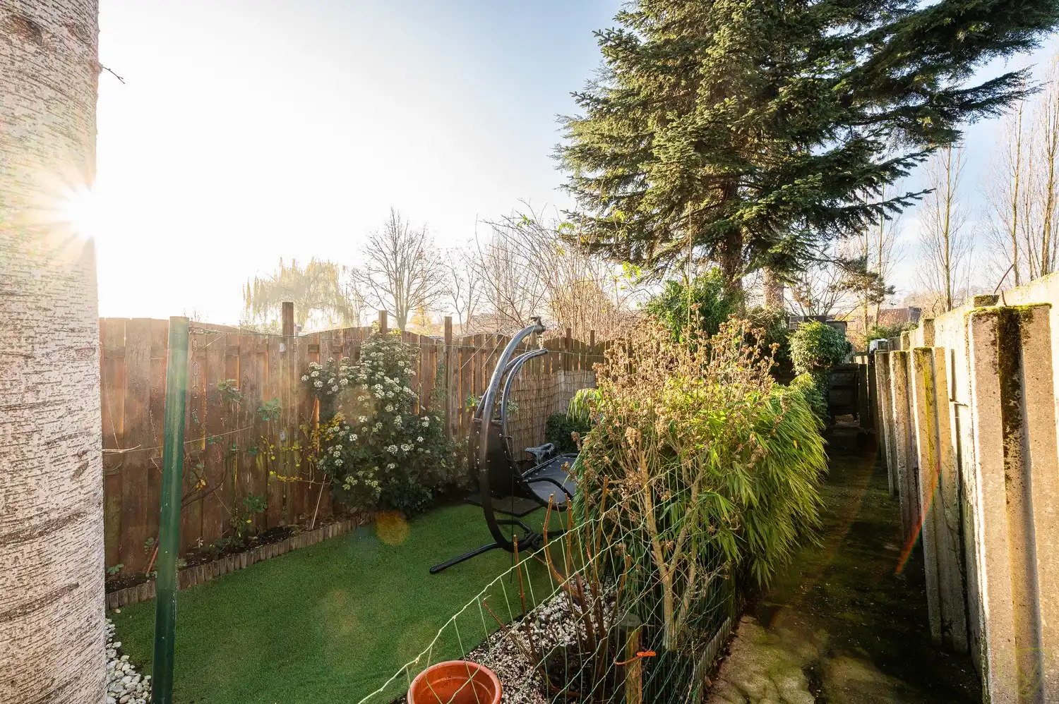 Charmante gesloten bebouwing met ruime tuin en renovatiepotentieel foto 23