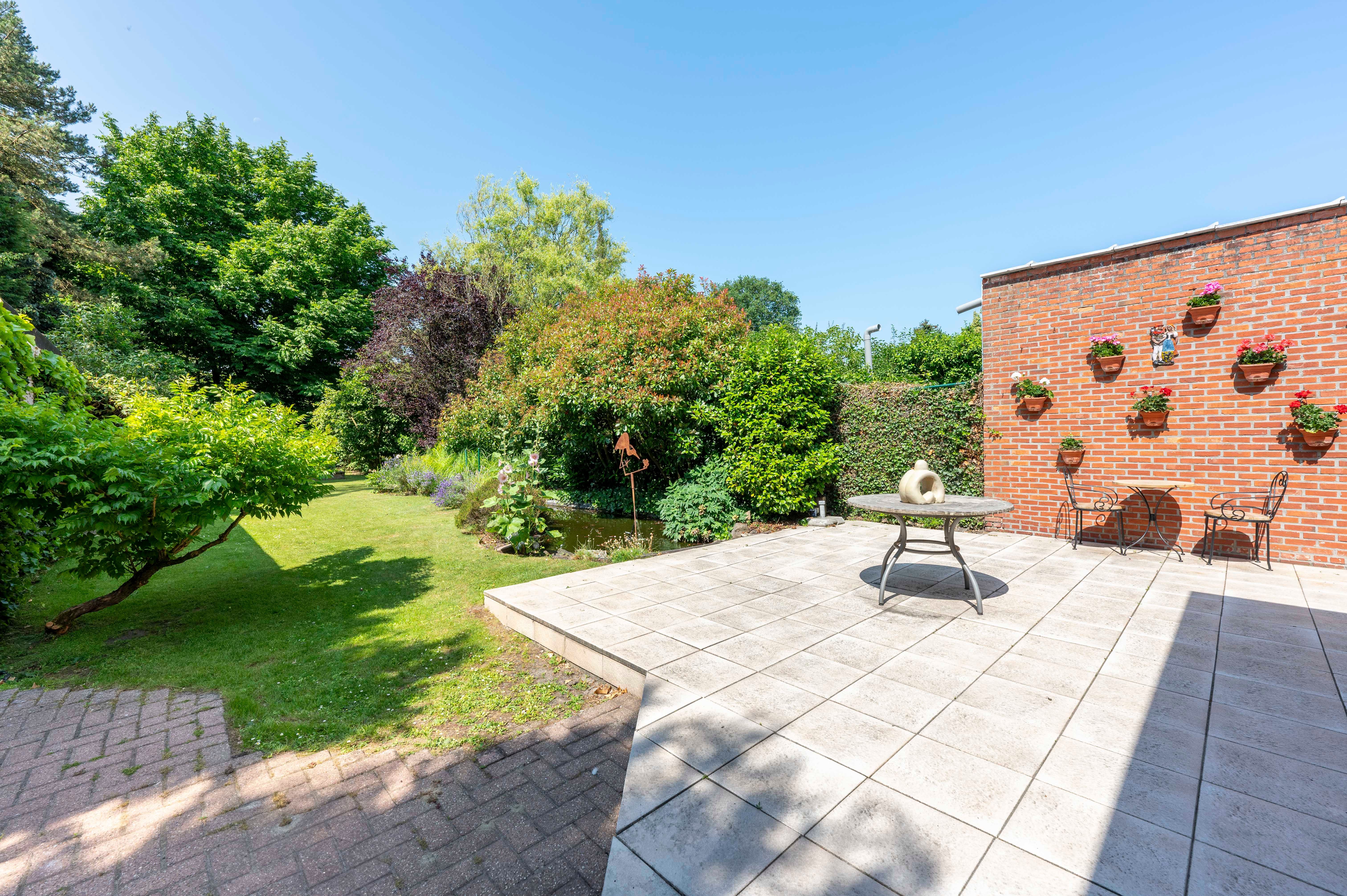 Gezinswoning met grote tuin in kindvriendelijke wijk Driehoek te Brasschaat! foto 16