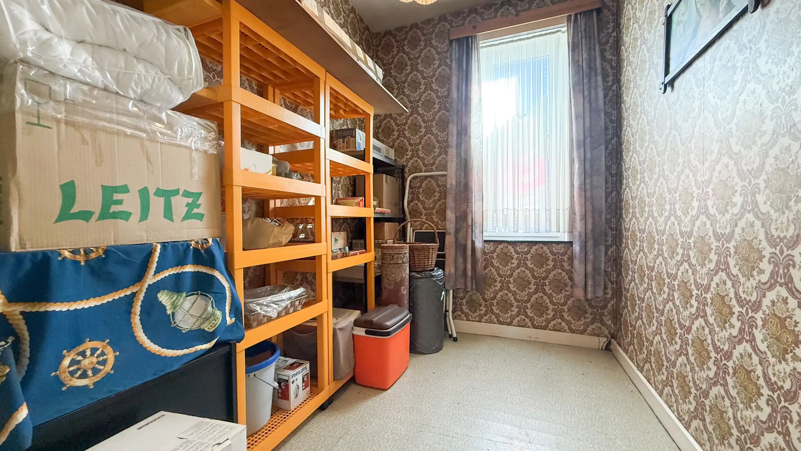 Op te frissen rijhuis met 3slpk + tuin in Sint-Truiden! foto 17