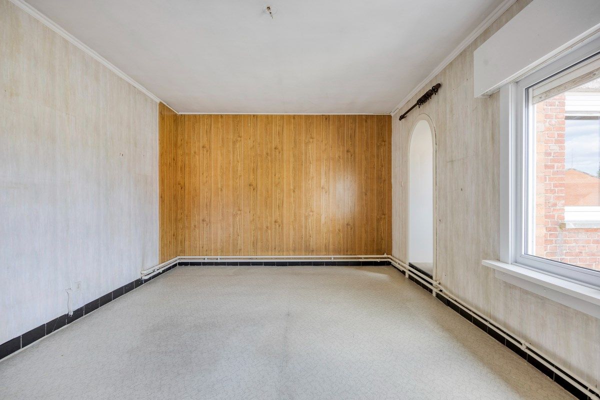 Ruim ingedeelde woning met 3slpks op een gunstige ligging. foto 20