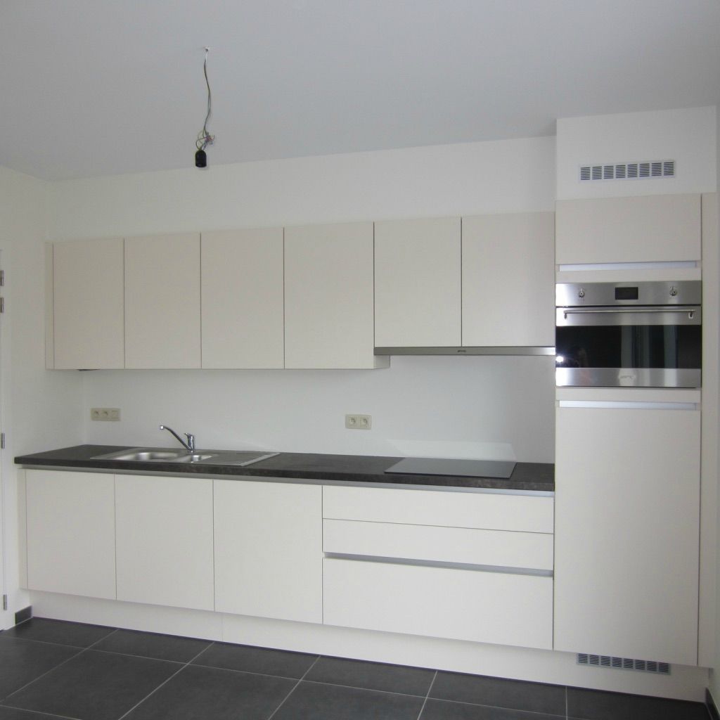 Mooie woning in rustige buurt met tuin en carport foto 4