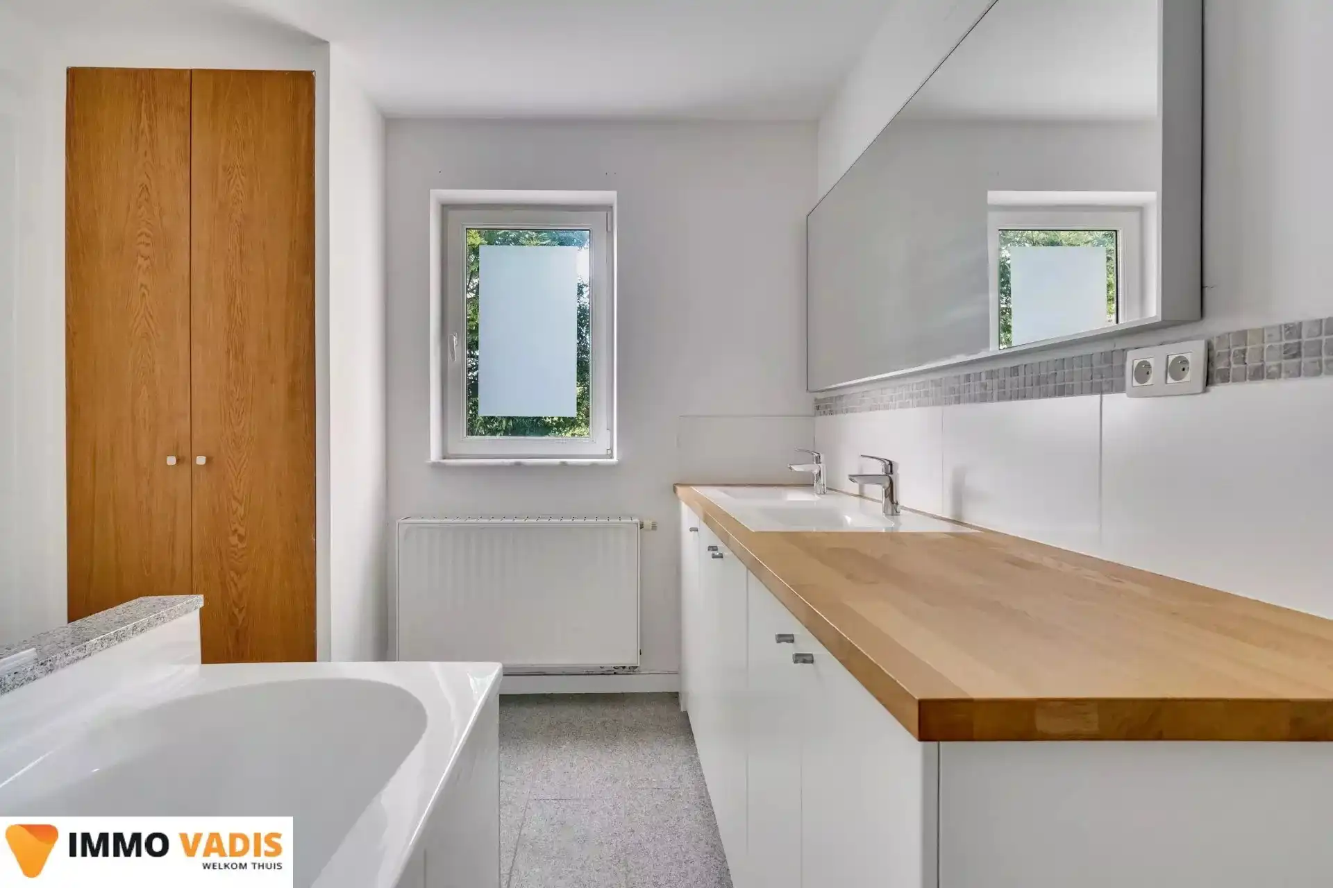 Ruim gelijkvloers appartement met  3 slaapkamers foto 6