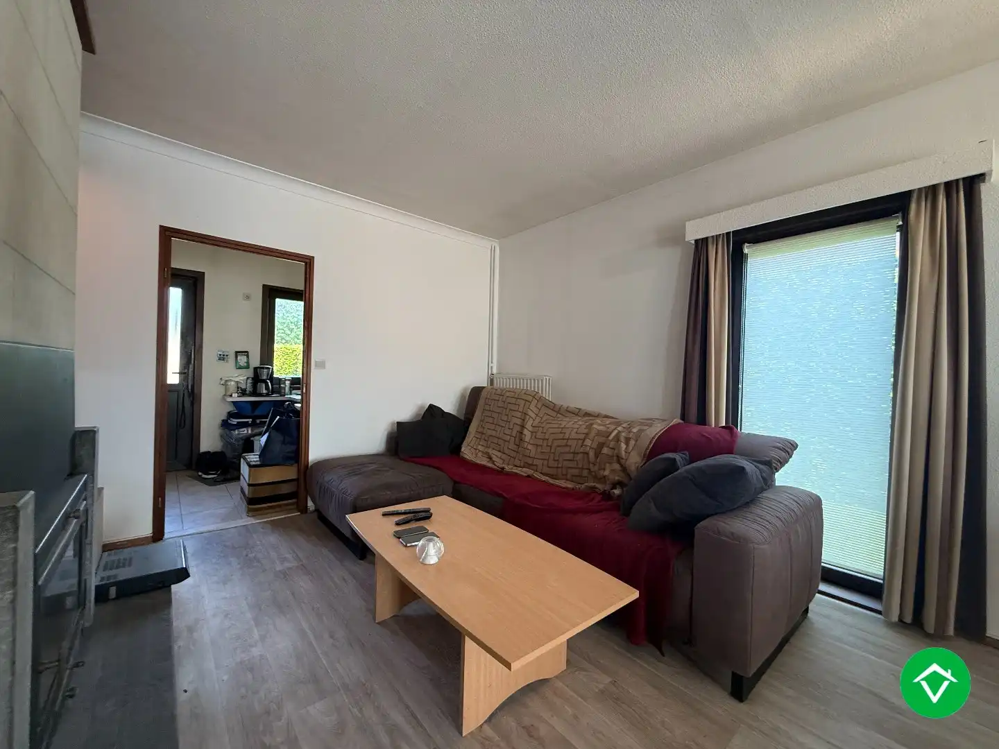 Rustig gelegen gelijkvloerse halfopen woning met 2 slpk's + dubbele garage foto 5