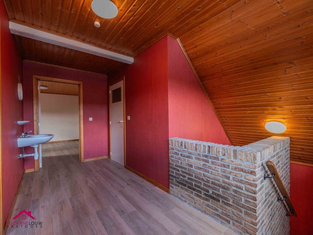 Ruim duplexappartement met 3 slaapkamers foto 23