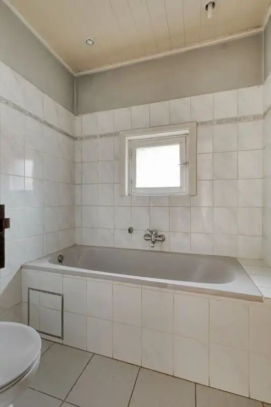 Statig herenhuis in het hart van Brakel foto 16