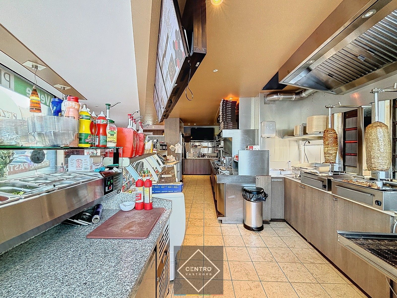 Woon- en handelshuis (handelszaak + 2 appartementen) met garage! foto 4