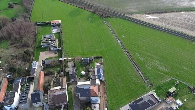 Zuid georiënteerd perceel bouwgrond centrum Evergem foto 2