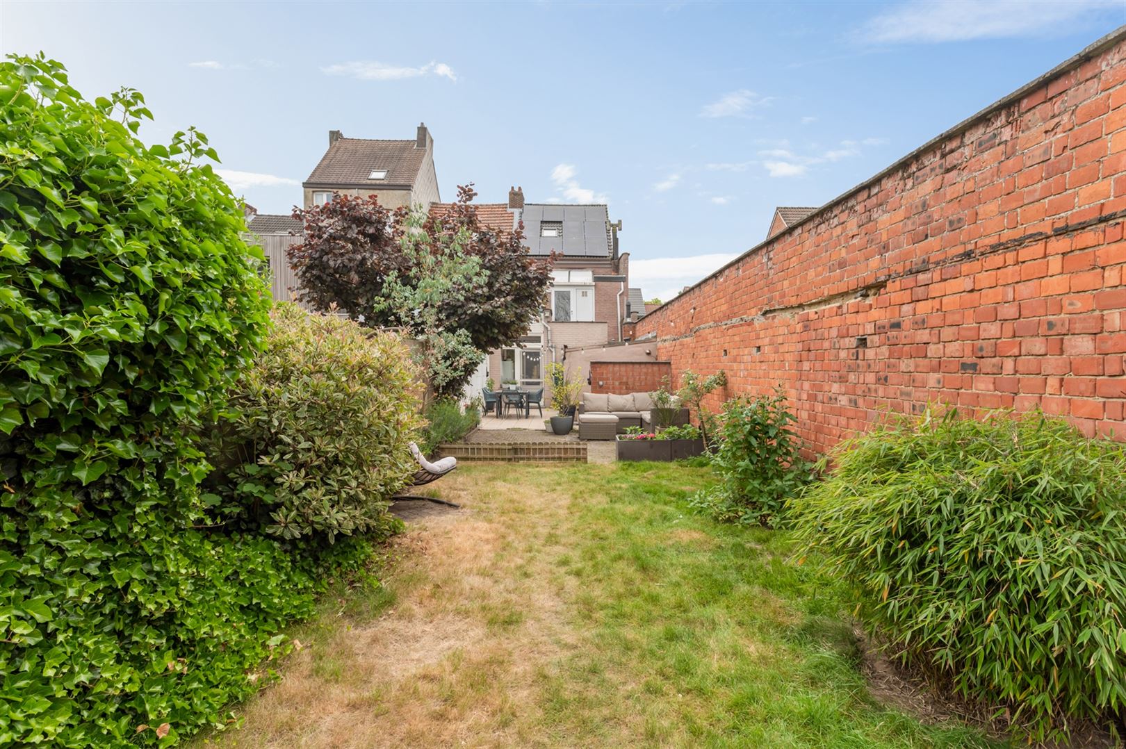 Centraal gelegen ééngezinswoning met 4 slaapkamers en tuin. foto 3