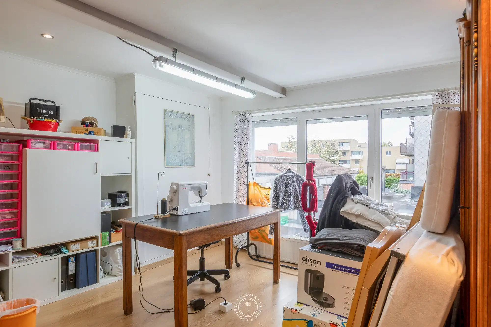 Drieslaapkamer woning met handelsfunctie aan het station van Beveren foto 14