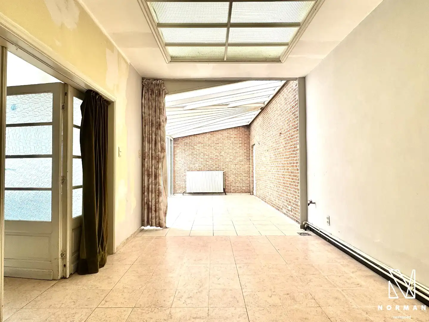 Te renoveren woning met 4 slaapkamers te koop in centrum Kuurne! foto 4
