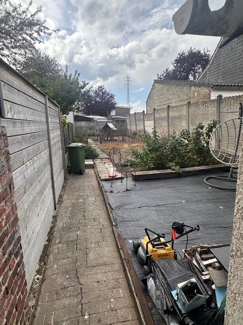 Gesloten garagebox met tuin foto 3