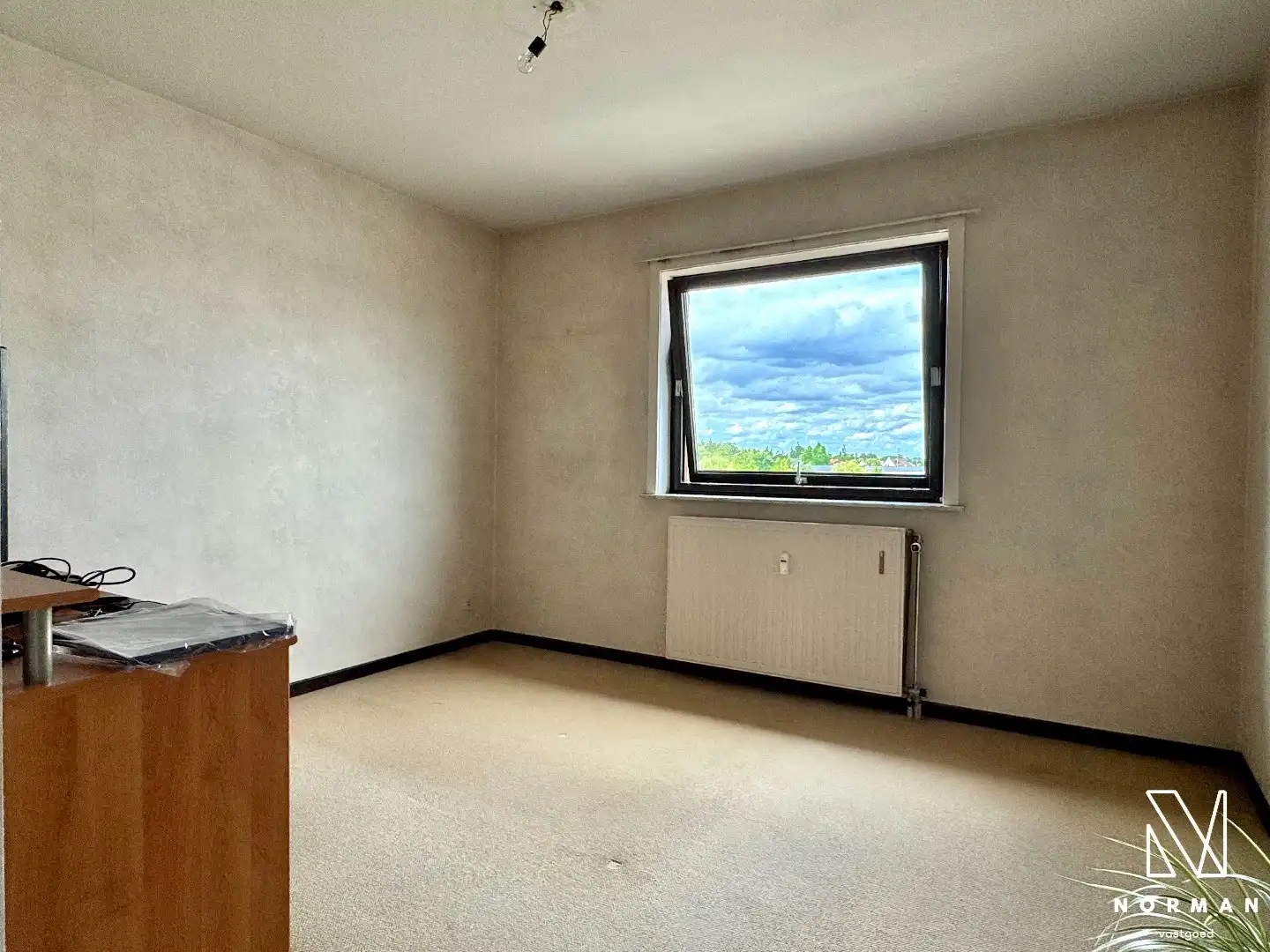 Instapklaar 2-slaapkamer appartement inclusief autostaanplaats en terras te koop in Kuurne! foto 11