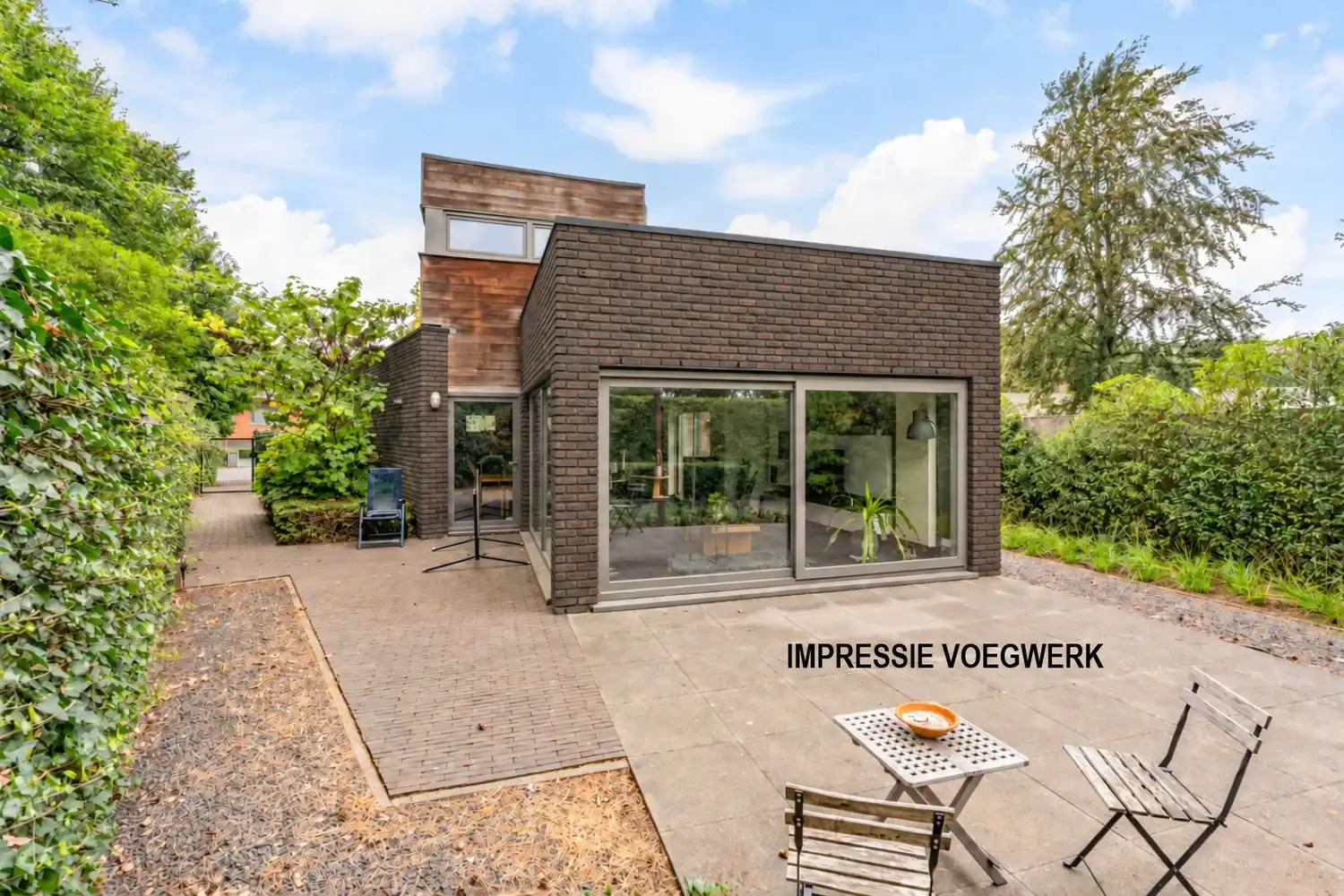 Gezinswoning met stijlvolle architectuur op wandelafstand van natuurgebied foto 8
