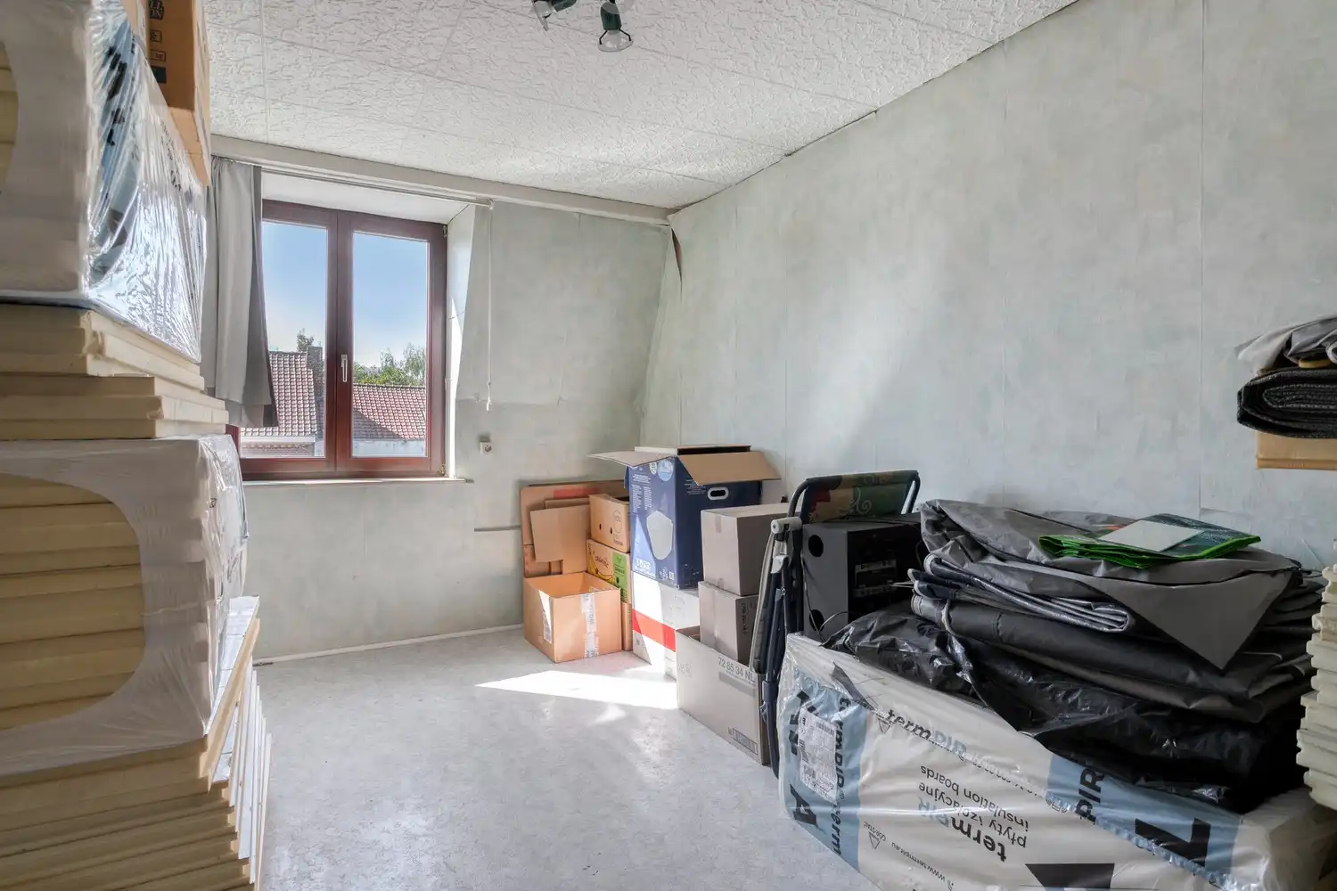 Karaktervolle stadswoning met renovatiepotentieel en unieke troef foto 12
