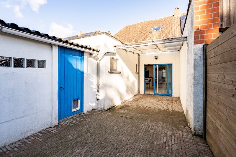 Instapklare woning met ruime keuken, tuin en garage op centrale locatie foto 27