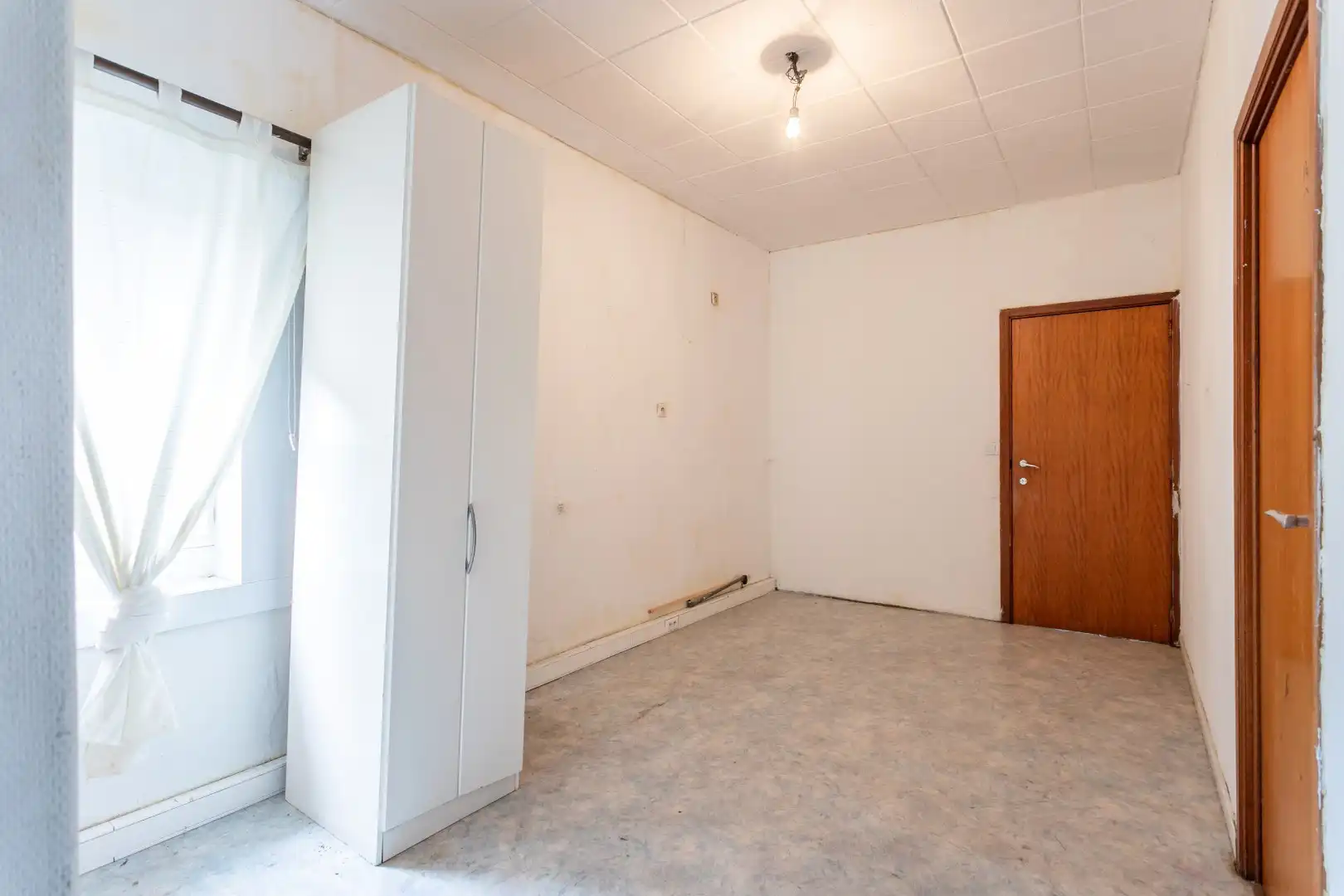 Handelsruimte met woonst op een gunstige ligging foto 13