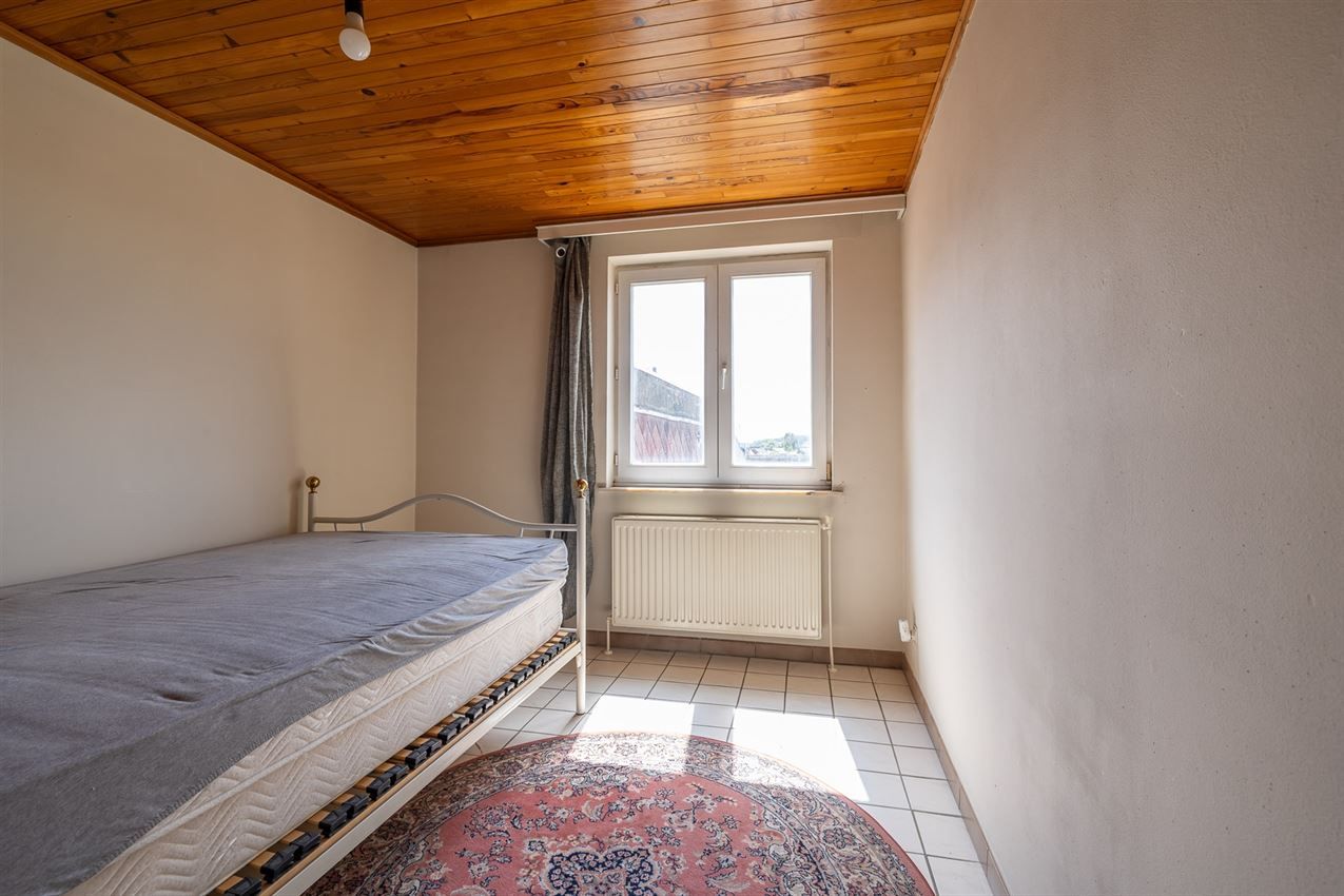 Verzorgd gebouw met handelszaak en 2 apt foto 29