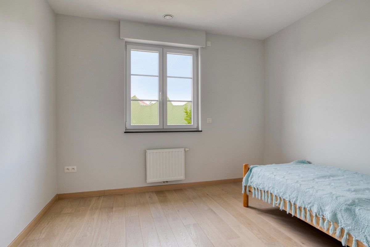 Recente halfopen woning met 4 slaapkamers en garage! foto 14