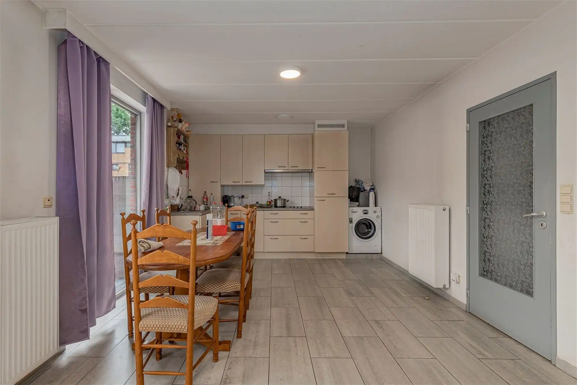 Lichtrijk 1-slaapkamer appartement met tuin en garagebox te koop in Merksem foto 3