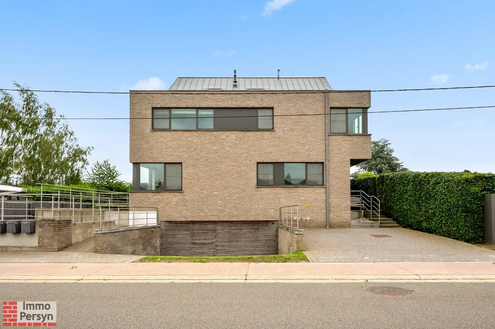 Modern en veelzijdig gebouw met 3 appartementen, rustige tuin en aanpalend perceel te Bekkevoort foto 2