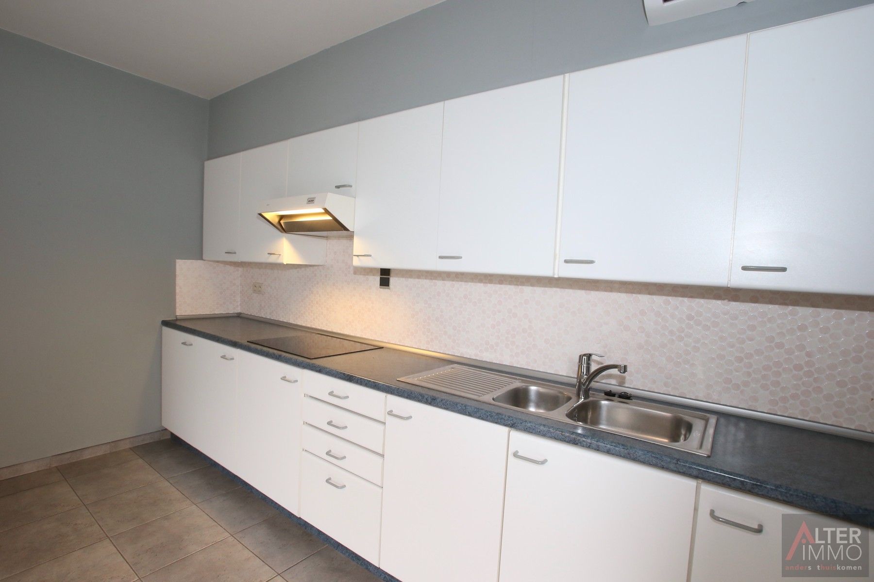 Ruime woning (205m2 NBO)  met 3 slaapkamers op een perceel van 24a 50ca! De woning is ingericht als "kangoeroewoning". foto 6