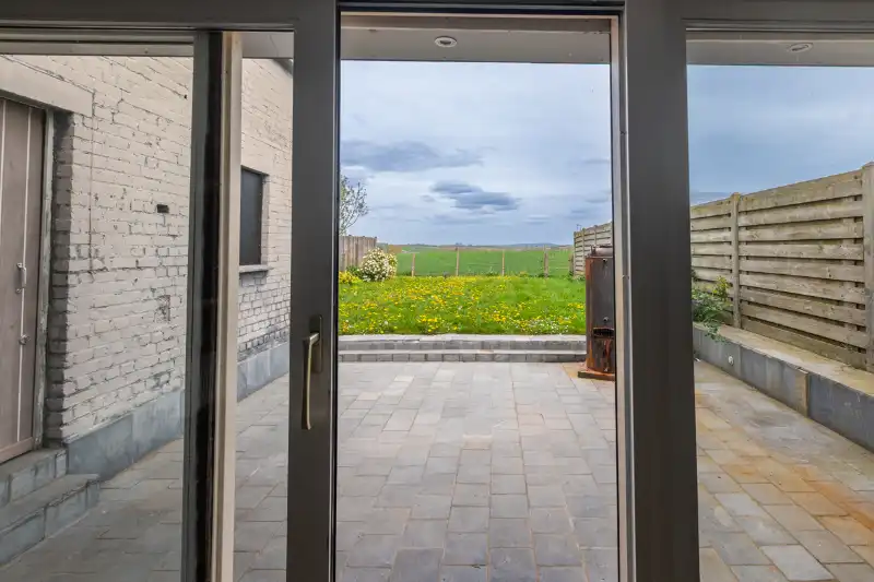 Instapklare woning met 4 slaapkamers, tuin en kleine garage met landelijk zicht  (energielabel B)! foto 6