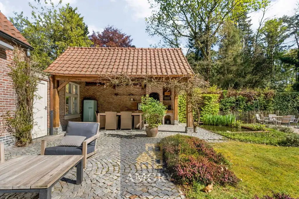 Karaktervolle villa met uitzonderlijke tuin op toplocatie! foto 16