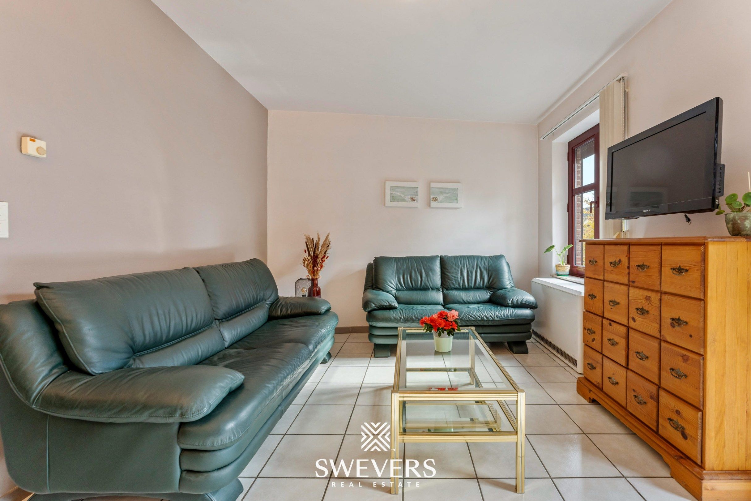 Instapklaar en lichtrijk duplexappartement in centrum Herk-de-Stad foto 3