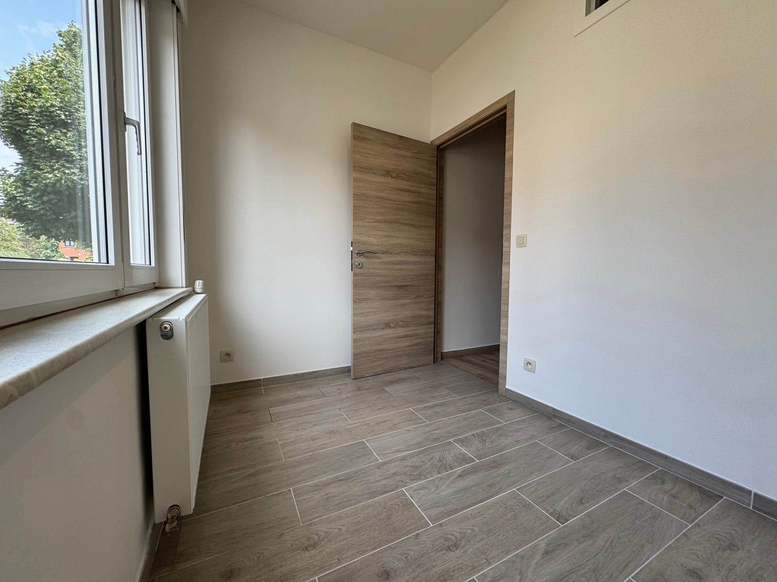 Rustig gelegen gelijkvloers-appartement met tuin foto 12