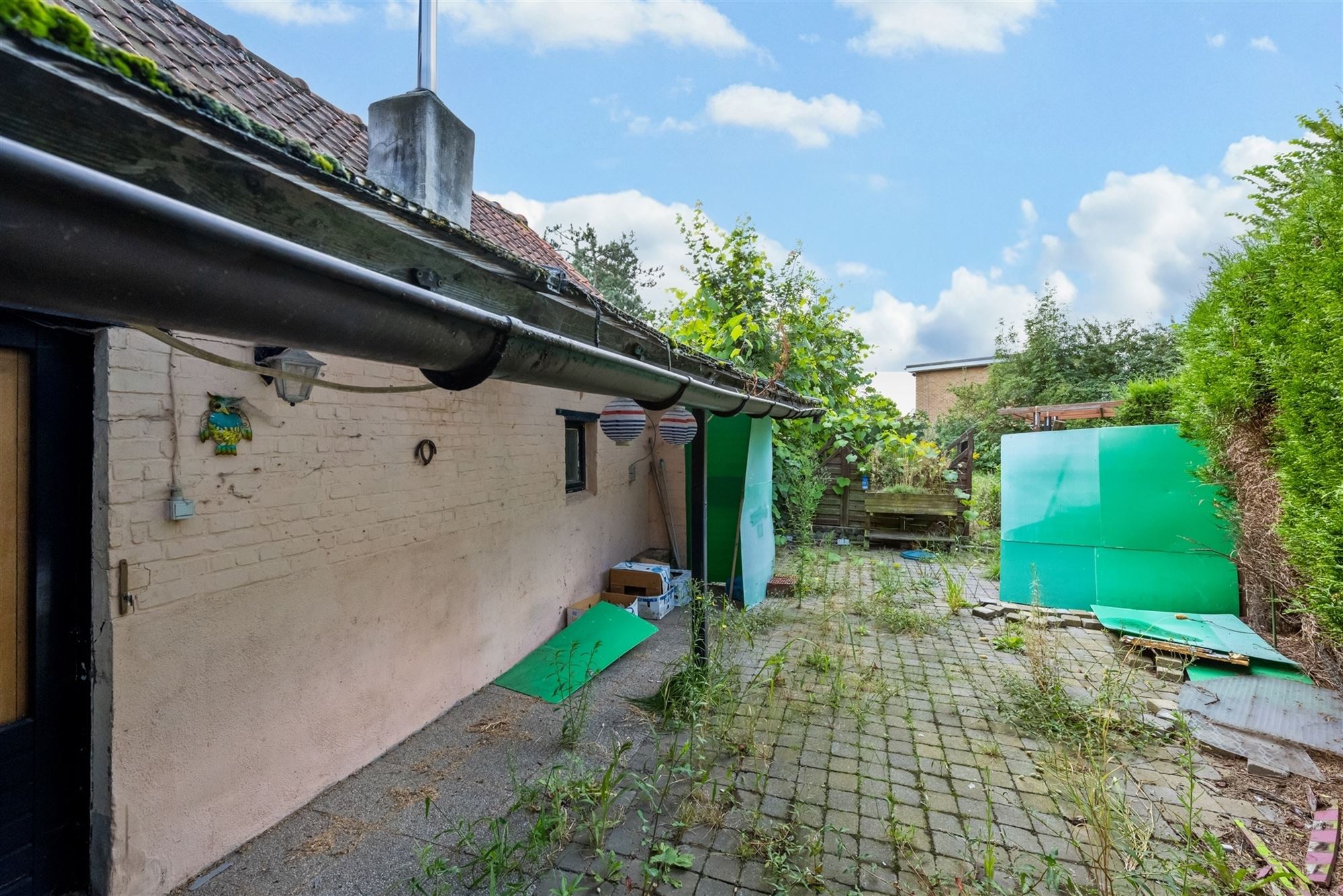 Te renoveren woning met mooie tuin, centrum Laarne! foto 18