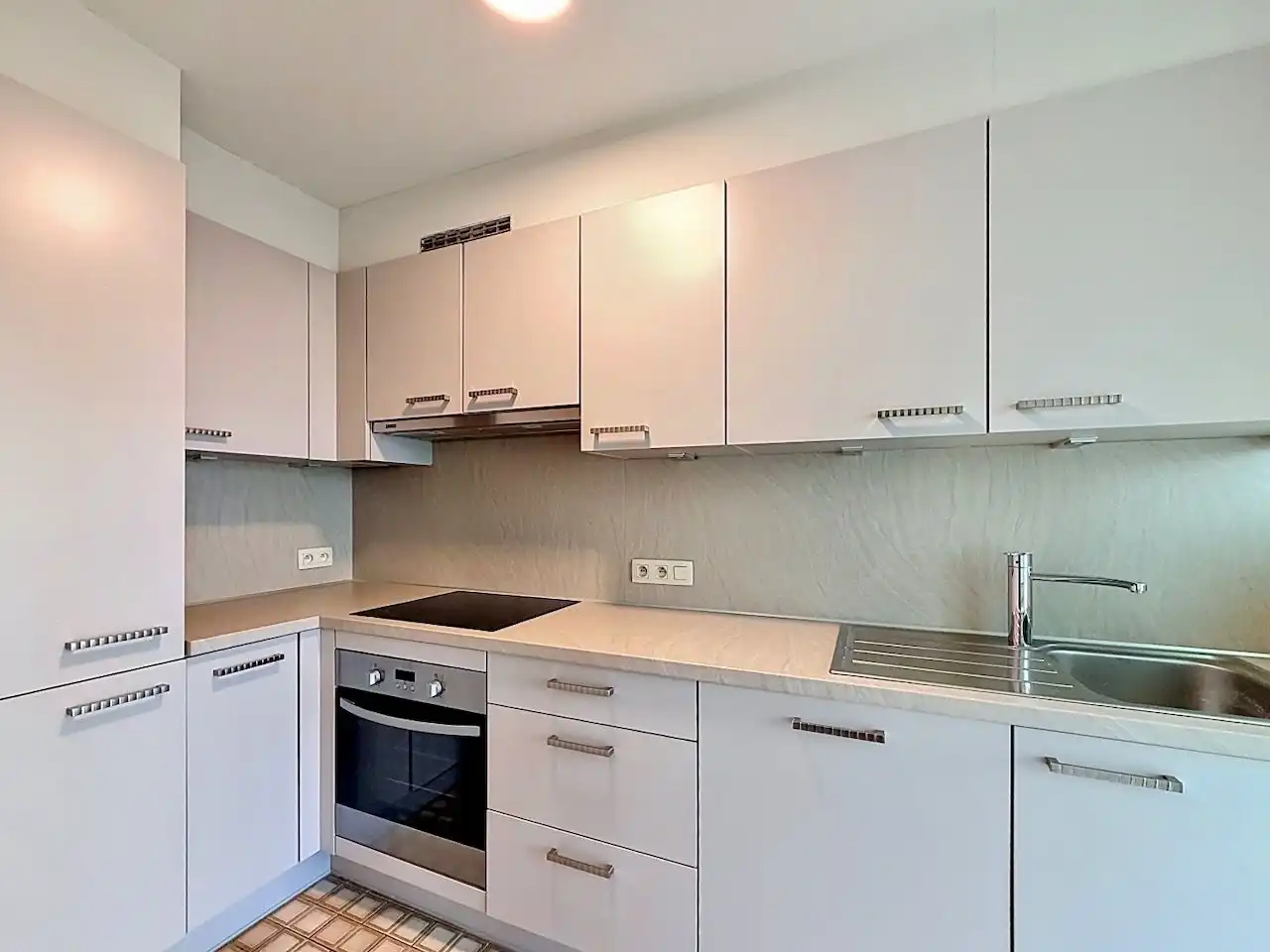 Gezellig 2-slaapkamerappartement op de 5de verdieping gelegen op de Graaf d’Ursellaan foto 8