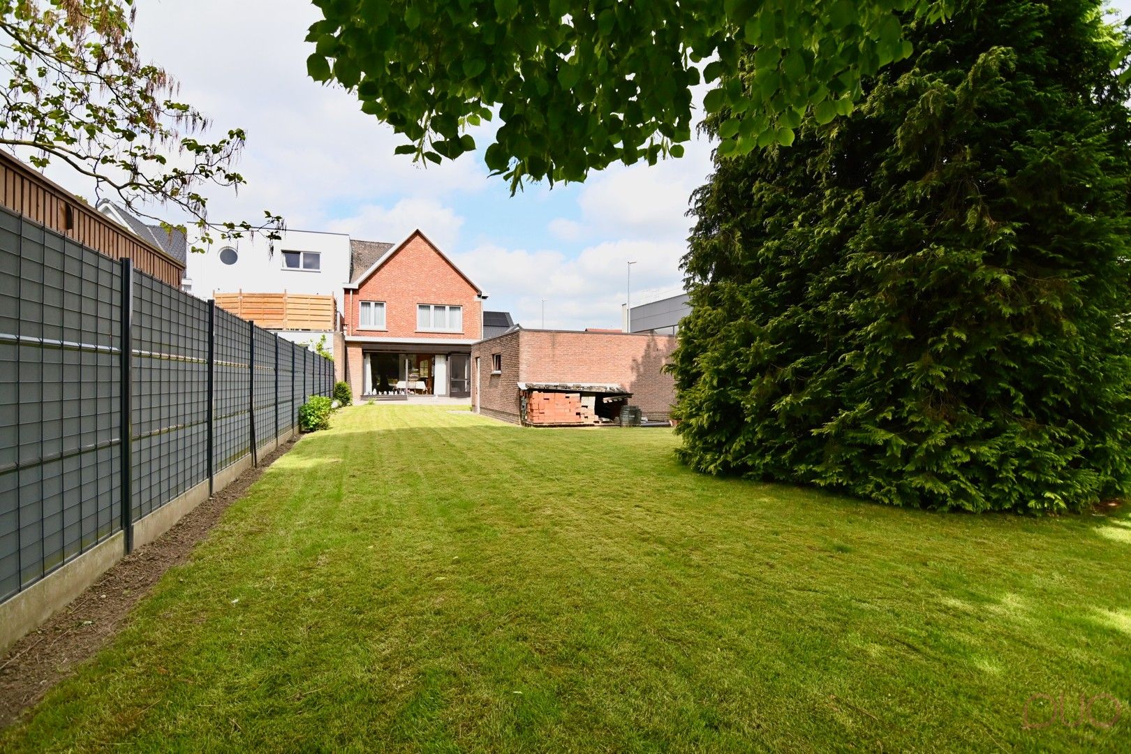 Charmante halfopen gezinswoning nabij het centrum van Sint-Truiden met 2 garages foto 27